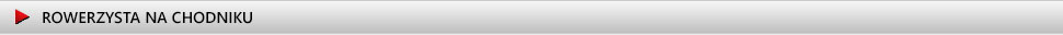rowerzysta na chodniku